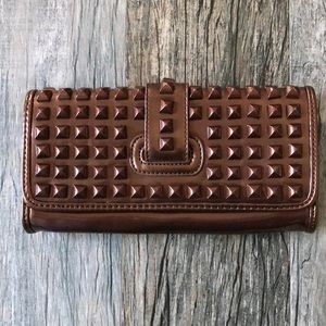 Bronze studded edgy clutch bag